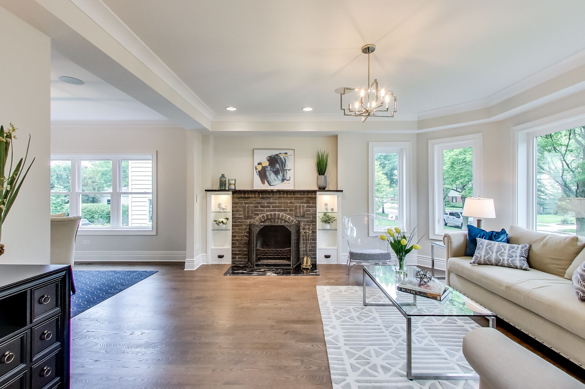 Custom bookcases flanking fireplace