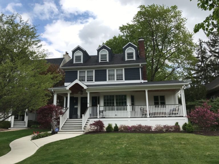This home addition included a new front porch; home addition contractor; patio and porch contractor